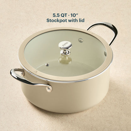 Beige stockpot with lid on a beige background