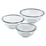 Three clear glass bowls on a white background